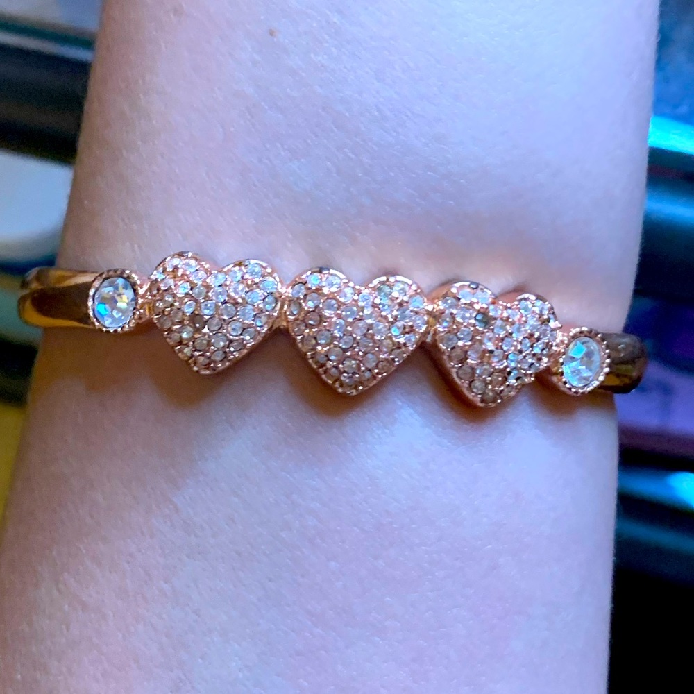 Betsy Johnson three hearts snap bracelet